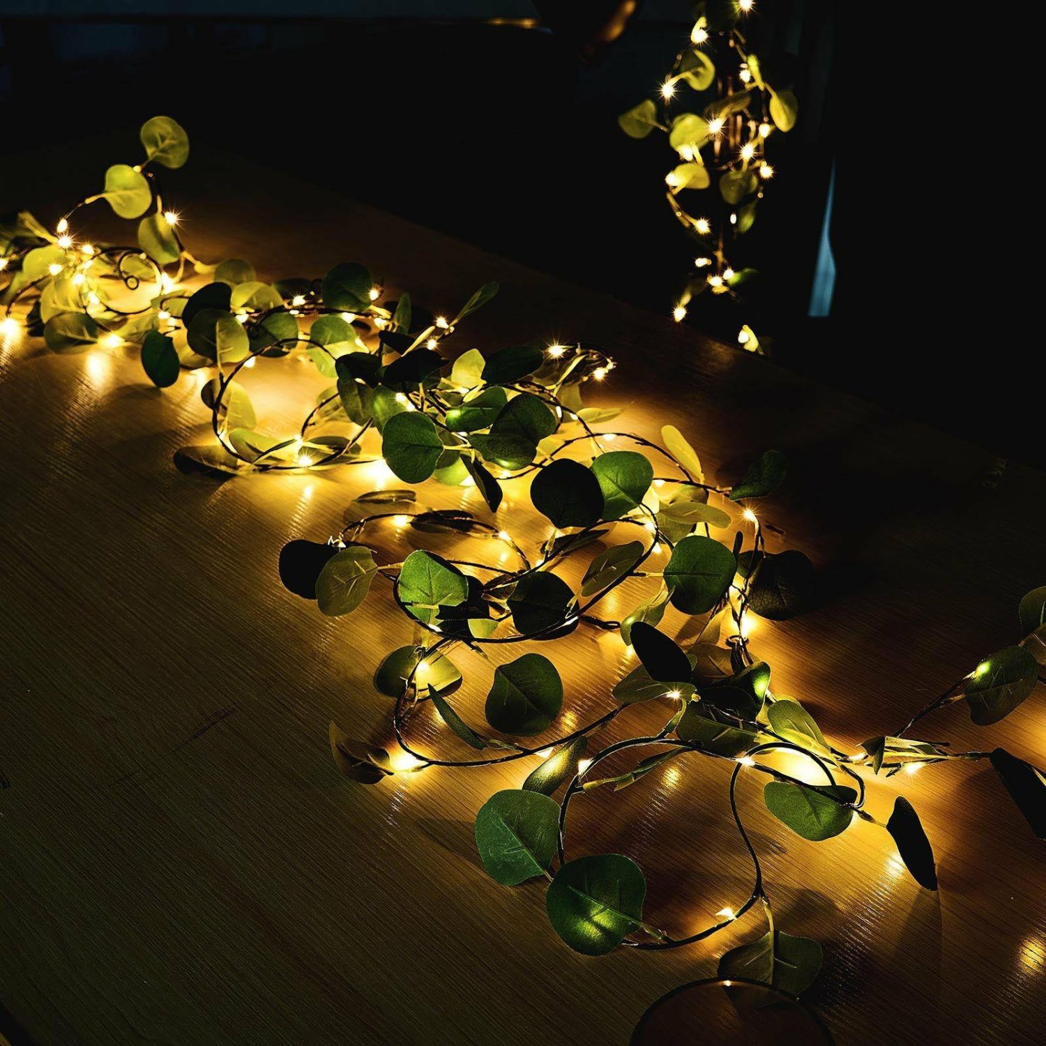 Letters & Strings | 100 LED Green Silk Eucalyptus Leaf Garland Vine String Lights, Warm White Battery Operated 32ft Centerpiece LED Eucalyptus Leaf Garland